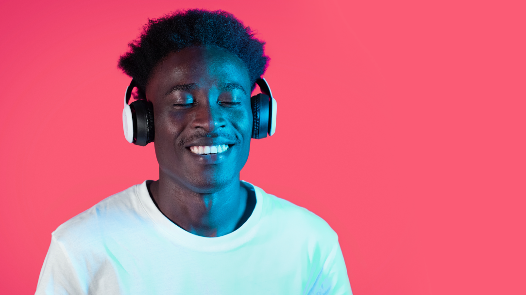 A man listening to music through his headphones