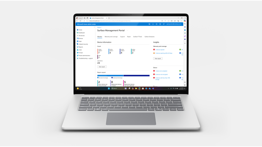A Surface Laptop device sitting open and front facing, with a screen showing management solutions.
